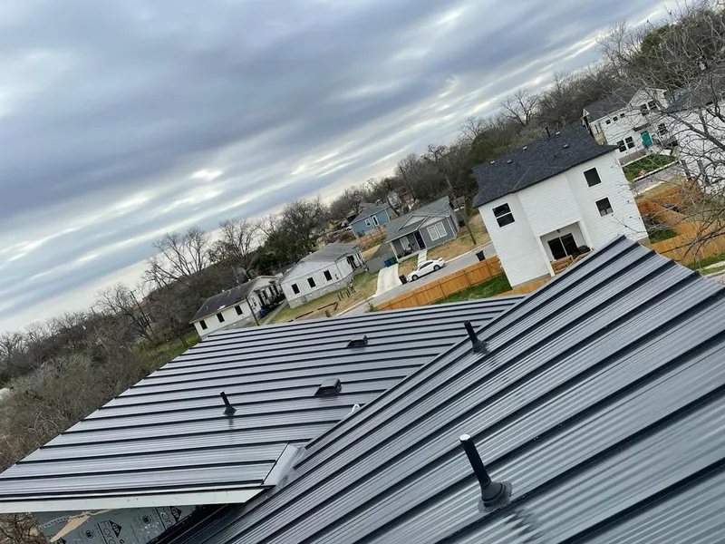 Standing seam metal roof panels with vents for Skylight Repair in Elon